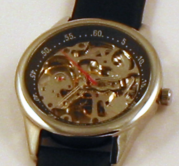 Mechanical (wind up),17 Jewels, no batteries required, see thru skeleton, natural leather black band,running time per winding no less than 38 hours, 3 hands, watch case measures 1.5 inches in diameter, length with band is 9 3/4 inches, MIN ORDER -200 watches. Delivery time - 75 days